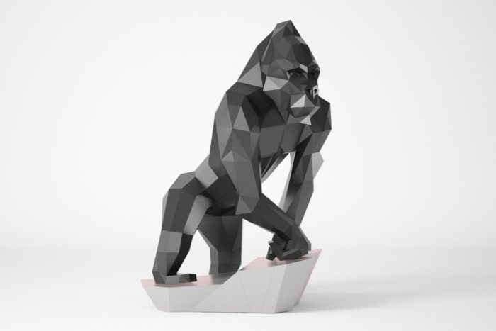 Gorilla low poly sitting on a stone for papercraft